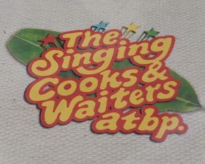 entrance sign of The Singing Cooks & Waiters