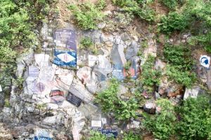 Ships tag the rocks above the pier