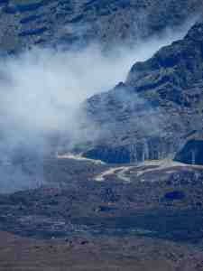 Afternoon clouds role thru the crator